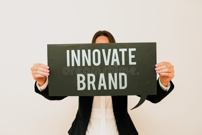 Hand writing sign Innovate Brandsignificant to innovate products, services and more. Business overview significant to stock images
