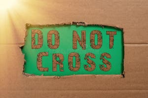 Sign Displaying Do Not Cross Word Written On Crossing Is Forbidden Sign Displaying Do Not Cross Word Written On Crossing Is Forbidden