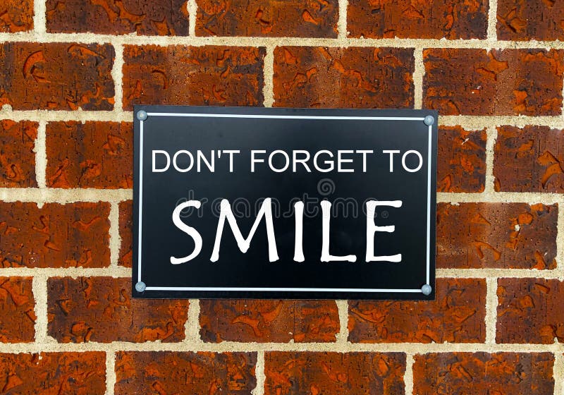 Conceptual hand writing showing Don T Forget To Smile. Business photo text Be always cheerful smiley spread and show. royalty free stock image