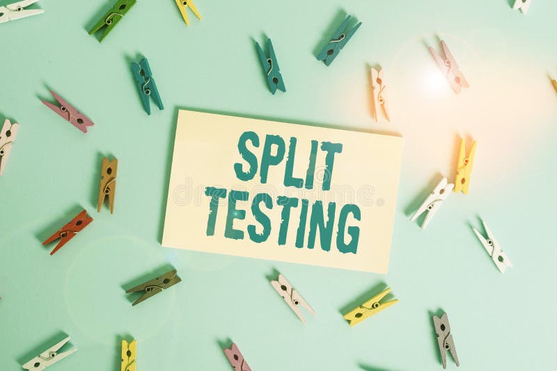 Conceptual hand writing showing Split Testing. Business photo text issuing the traffic of a website between two different URLs. Concept meaning issuing the traffic of a website between two different URLs Colored clothespin rectangle shaped paper blue background.