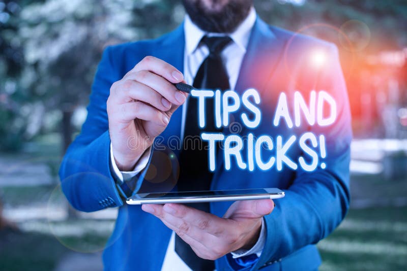 Conceptual Hand Writing Showing Tips and Tricks. Business Photo