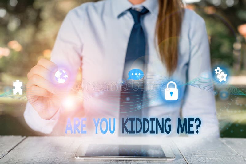 Conceptual hand writing showing Are You Kidding Me Question. Business photo showcasing Expression of Disbelief or could. Concept meaning Expression of Disbelief or could not be true Female human wear formal work suit presenting smart device.