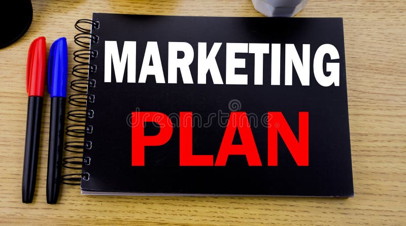 Conceptual hand writing text caption showing Marketing Plan. Business concept for Planning Successful Strategy written on sticky note with copy space on wood wooden background with sunglasses