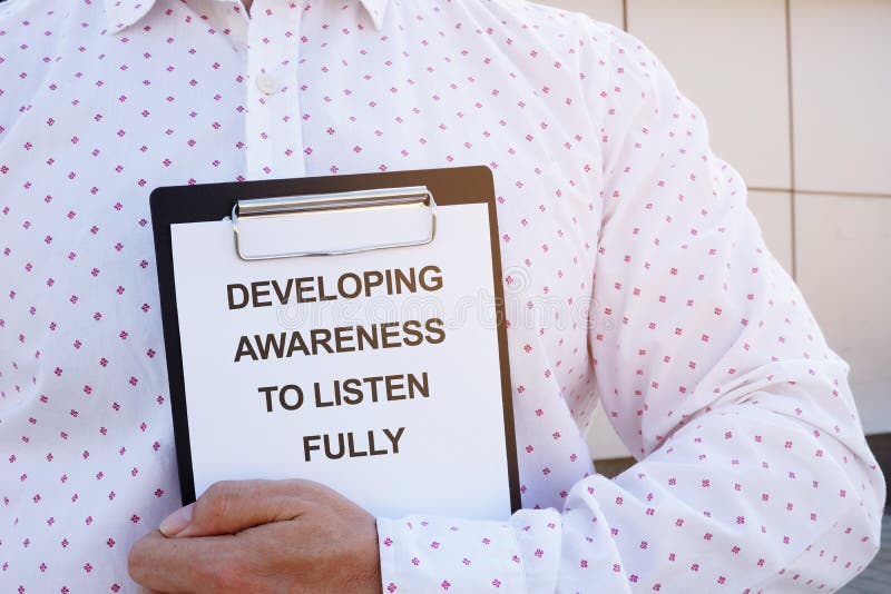 Conceptual hand writing text showing Developing Awareness to Listen Fully stock photos