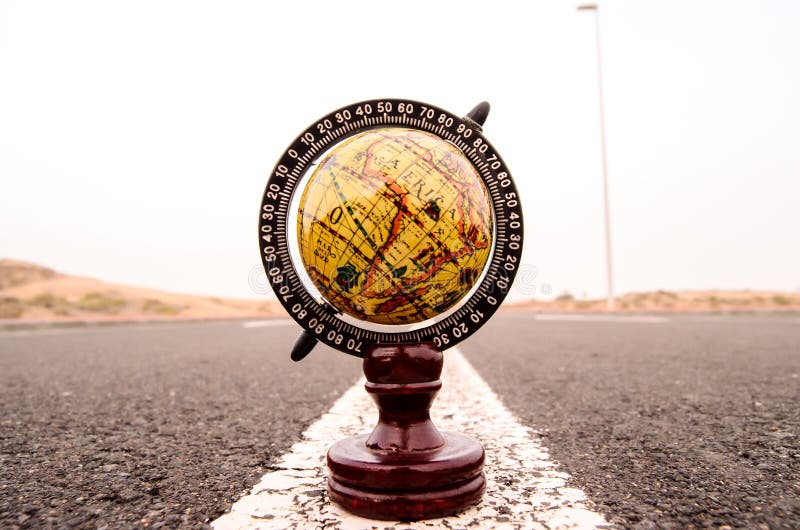 Globe Earth on an Asphalt Street , digital photo image stock photography