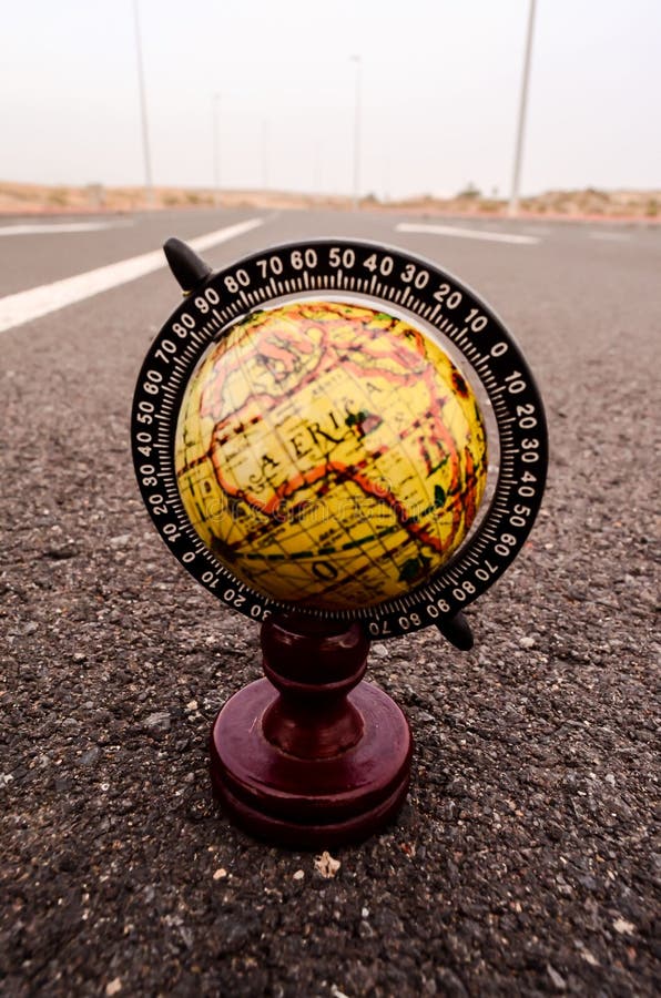 Globe Earth on an Asphalt Street , digital photo image royalty free stock image