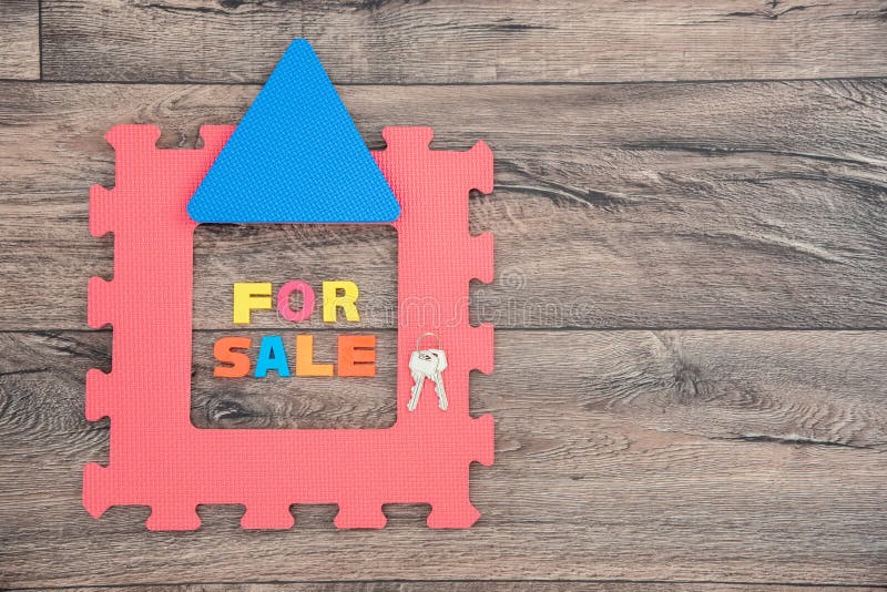 Conceptual Image of the Sale of a Toy House with a Fence and a Puppet Doll  Near it Stock Photo - Image of estate, conceptual: 179157082
