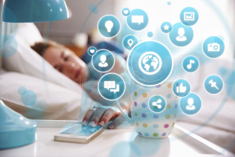 Conceptual Image Of Woman In Bed Using Social Media On Phone stock photography Conceptual Image Of Woman In Bed Using Social Media On Phone stock photography
