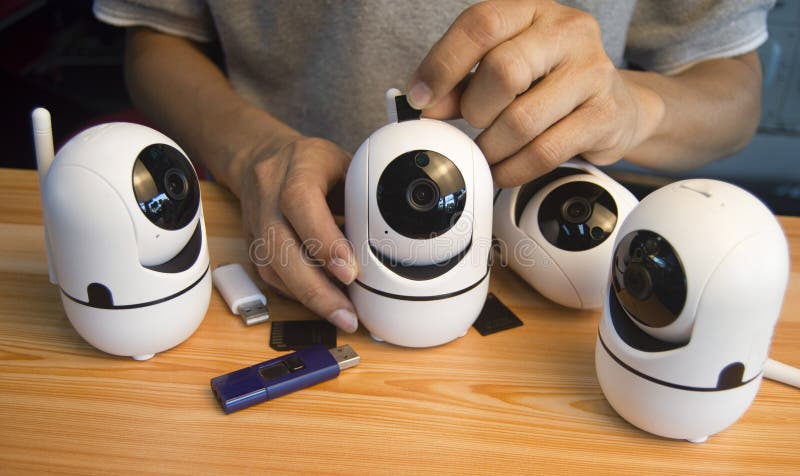 Conceptual man operating ip camera