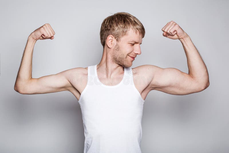 Conceptual portrait of a left handed man stock photography