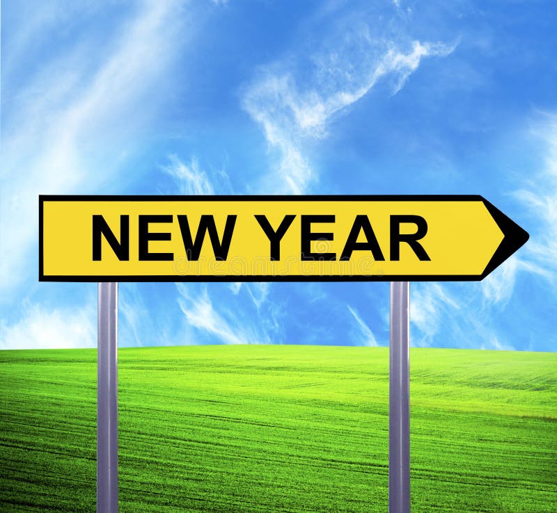 Conceptual arrow sign against beautiful landscape with text - NEW YEAR. Conceptual arrow sign against beautiful landscape with text - NEW YEAR