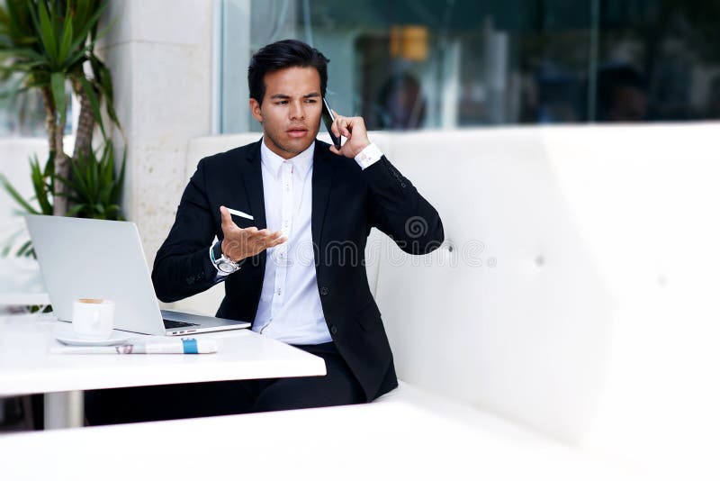 Concerned businessman received bad news having the smart phone conversation