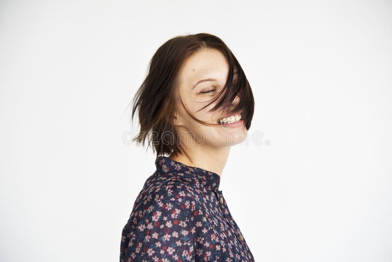 Concetto allegro sorridente della giovane donna fotografia stock Concetto allegro sorridente della giovane donna fotografia stock