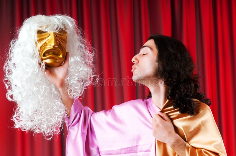 Concetto del teatro - attore mascherato fotografia stock libera da diritti Concetto del teatro - attore mascherato fotografia stock libera da diritti