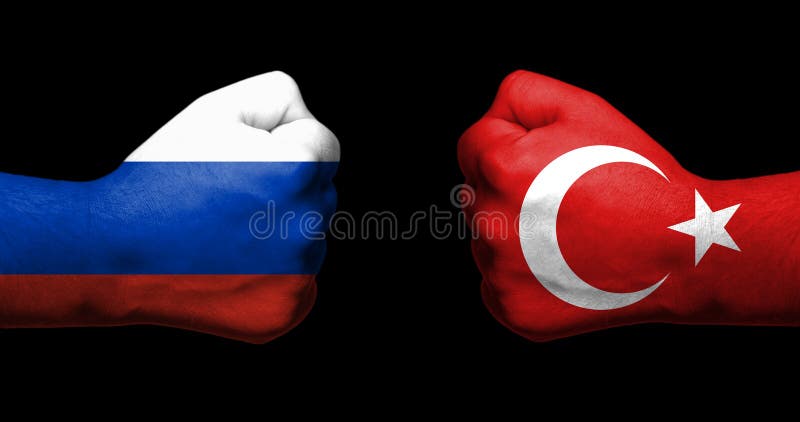 Concetto delle relazioni fra la Russia e Turchia simbolizzate da due pugni chiusi opposti a immagini stock libere da diritti Concetto delle relazioni fra la Russia e Turchia simbolizzate da due pugni chiusi opposti a immagini stock libere da diritti