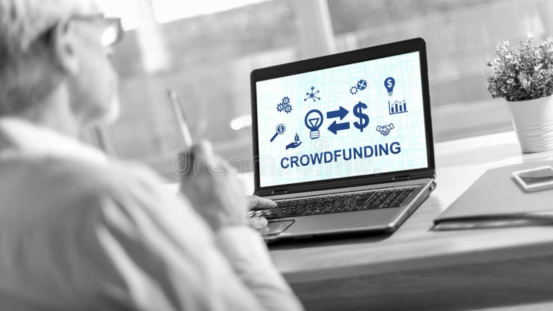 Concetto di crowdfunding su uno schermo di laptop fotografia stock