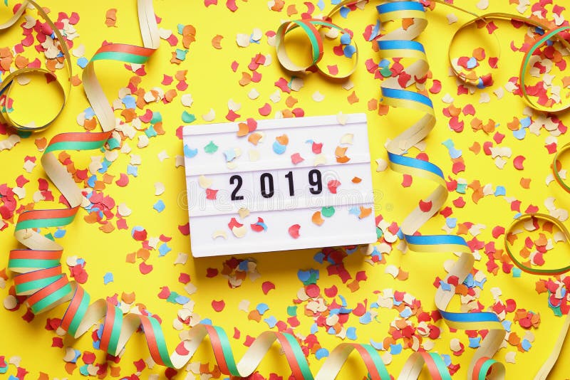 2019 new year celebration flat lay concept with confetti and streamers. 2019 new year celebration flat lay concept with confetti and streamers