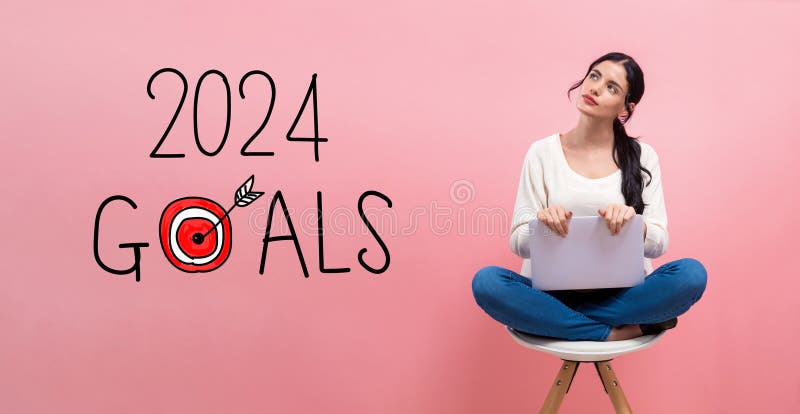 Concetto di obiettivi 2024 con donne che usano un portatile immagine stock libera da diritti