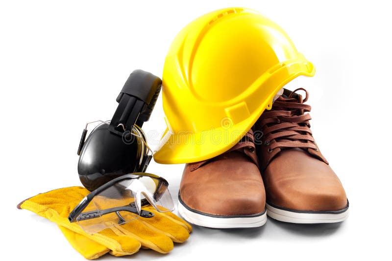 Concetto di sicurezza sul lavoro con guanti di protezione a cilindro duro stivali di sicurezza per gli occhi e di protezione dell'