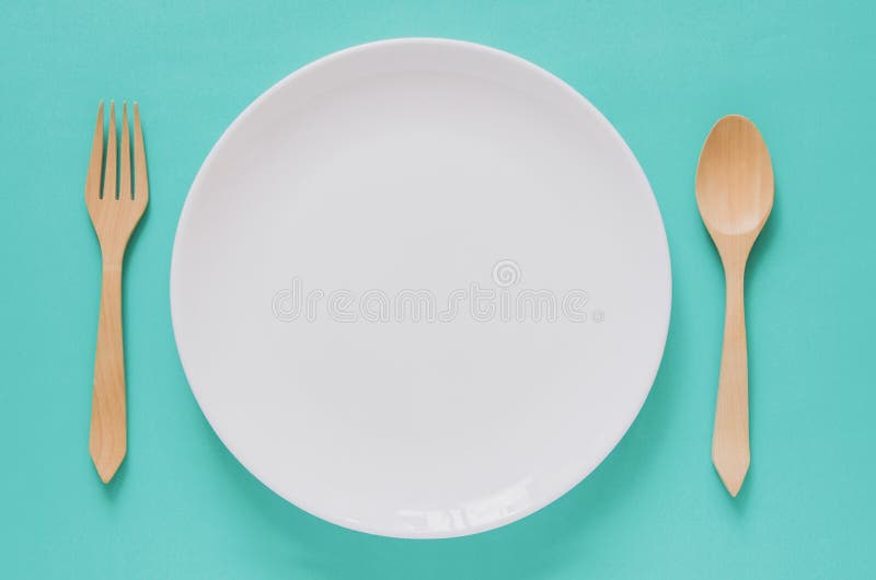 Concetto minimo del fondo della cena Vista superiore del piatto bianco vuoto immagini stock Concetto minimo del fondo della cena Vista superiore del piatto bianco vuoto immagini stock