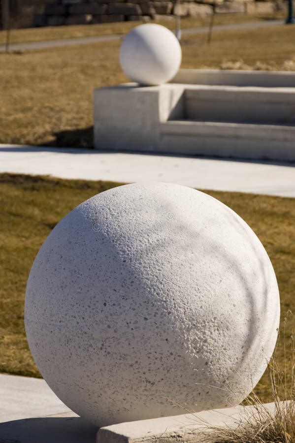 Concrete Balls As a Parking Barriers in the Residential Area Stock