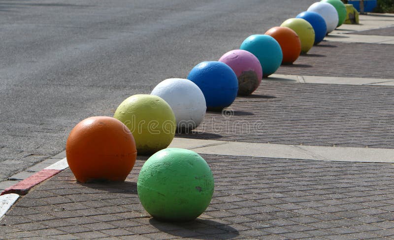Concrete Balls As a Parking Barriers in the Residential Area Stock