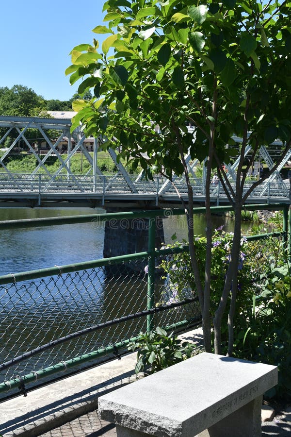 Concrete bench on Bridge of Flowers, Shelburne Falls, Franklin County, Massacusetts, United States, USA royalty free stock image Concrete bench on Bridge of Flowers, Shelburne Falls, Franklin County, Massacusetts, United States, USA royalty free stock image