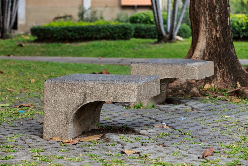 Concrete chair in the park stock image. Image of spring 48633063