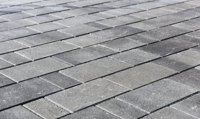 Concrete or cobble gray pavement slabs or stones for floor, wal