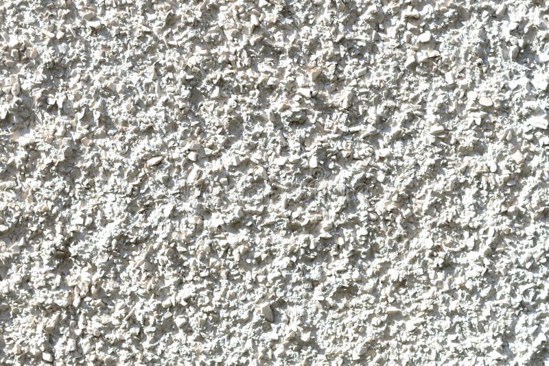 Crushed stone, plaster, concrete wall royalty free stock photo
