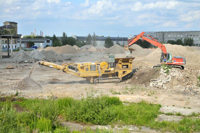 Concrete crushing machine stock photo. Image of dirt - 25978716