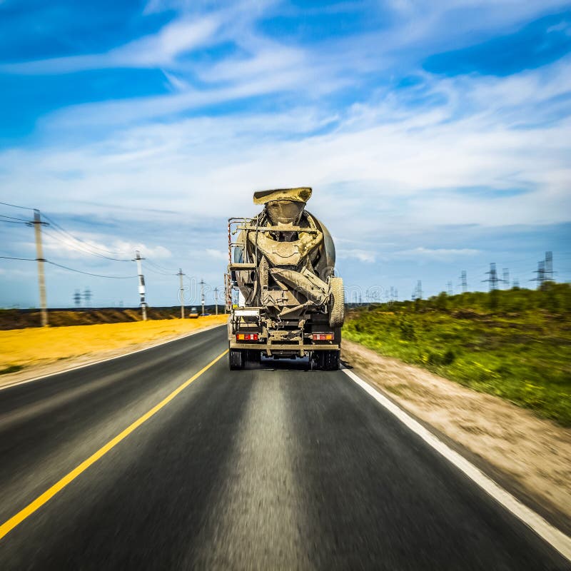 Concrete mixer on the road stock photo. Image of motion 275116662