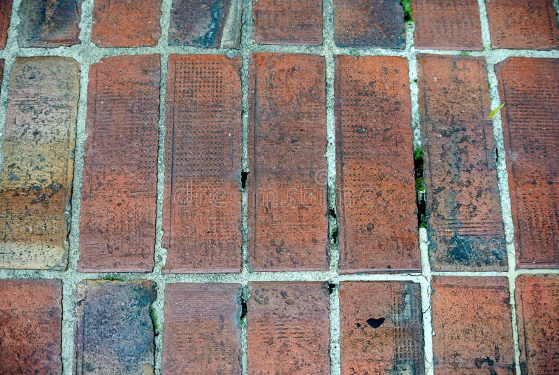 Concrete Pavers of Various Colors are Arranged According To the Design