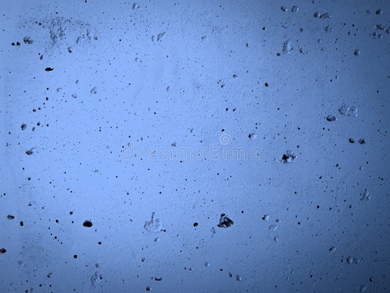 Concrete Wall with Irregularities Painted with Blue Paint. Abstract