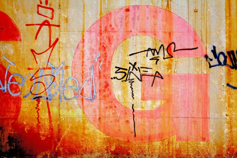 Concrete wall with lettering, grungy background