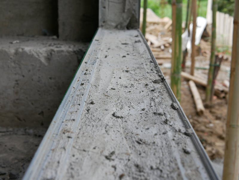 Concrete Window Edge is Being Prepared by Having Plastic Corner Bead