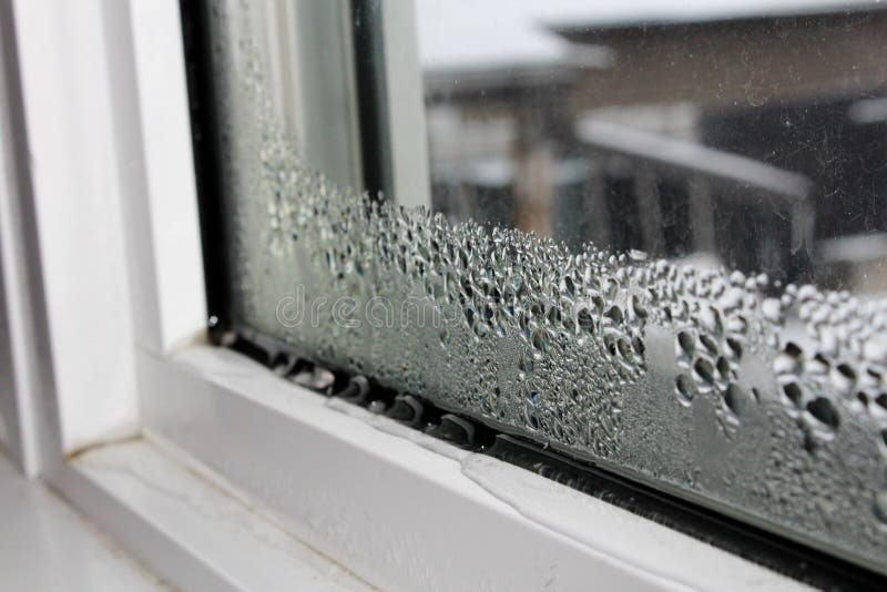 Water condensation on windows during winter. Water condensation on windows during winter.