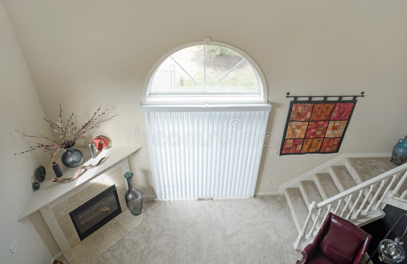 Condo Cathedral Wall with Arched Window & Blinds