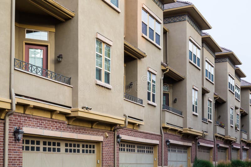 Condos with Drive Under Garages Stock Photo Image of texture