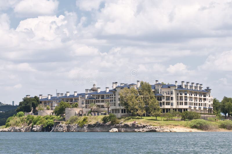 Condos on a lake in Texas stock photo. Image of texas 16247750