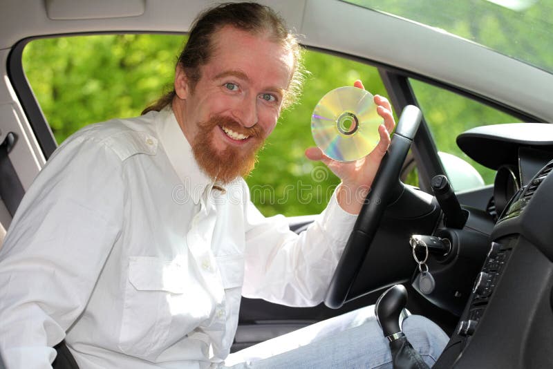 Conducteur avec du CD images libres de droits Conducteur avec du CD images libres de droits