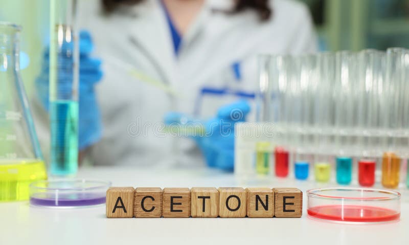 A laboratory scene showcasing acetone amidst an array of vibrant and colorful chemical solutions in glassware. Protocol analyzer stock images, royalty-free photos and pictures