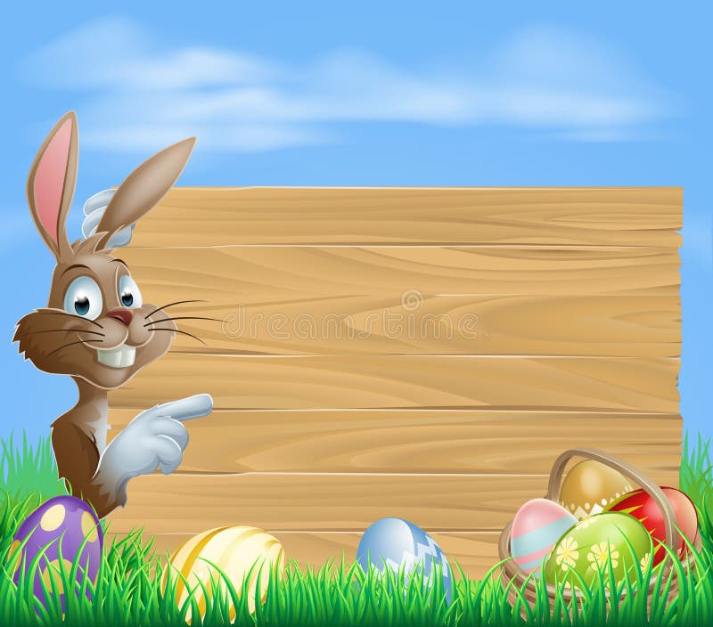 Conejito y huevos de pascua con la muestra de madera Conejito y huevos de pascua con la muestra de madera