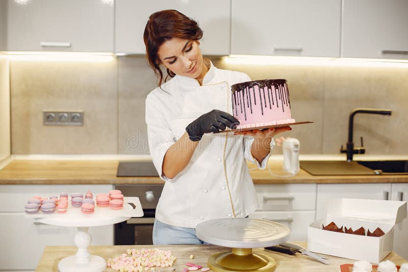 Confectioner in a Uniform Decorates the Cake Stock Photo Image of