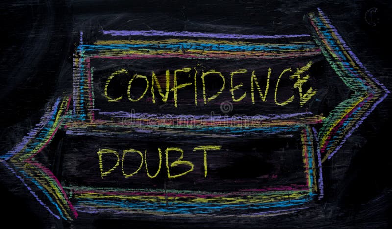 Confidence or Doubt written with color chalk concept on the blackboard stock photo Confidence or Doubt written with color chalk concept on the blackboard stock photo