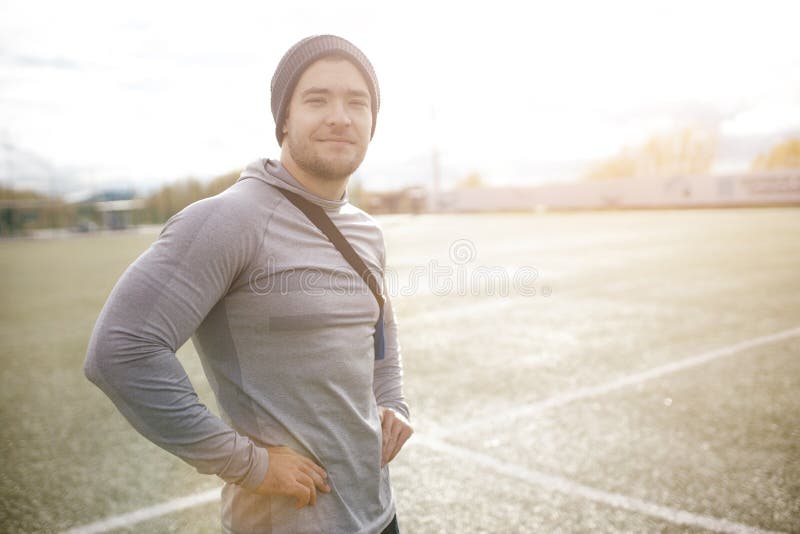 Muscular Man in His Thirties Relaxes on the Sports Podium. a Determined ...