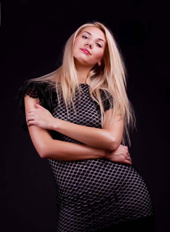 Confident blonde is posing stock photo. Image of blond - 13170736