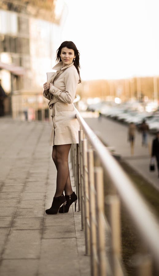 Confident Business Woman on a Modern Office Building Background Stock ...