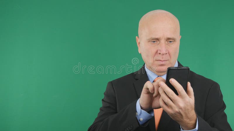 Confident Businessman Image Text Using Cell Phone royalty free stock photos