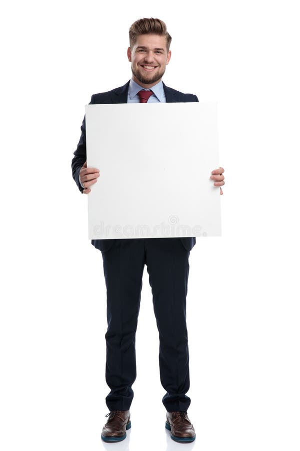 Confident businessman smiling and holding a blank billboard stock photos Confident businessman smiling and holding a blank billboard stock photos